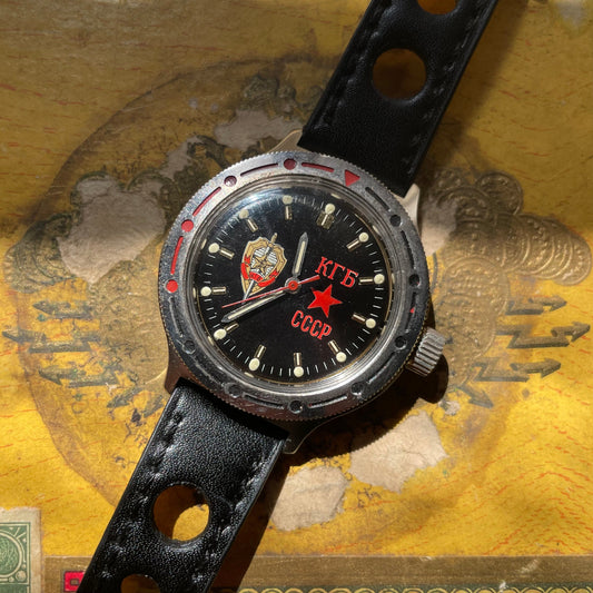 Vostok KGB Reloj en 1980 acero con dial negro y pulsera de cuero real