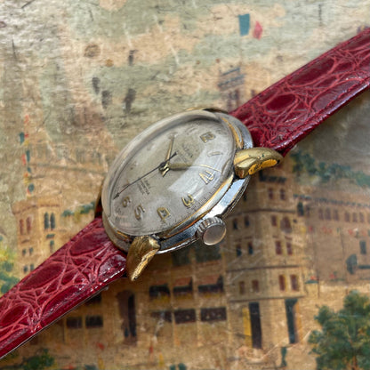 Vintage Herma Watch aus den 1950er Jahren in Stahl mit goldenen Hörnern und Krokodil -Lederarmband