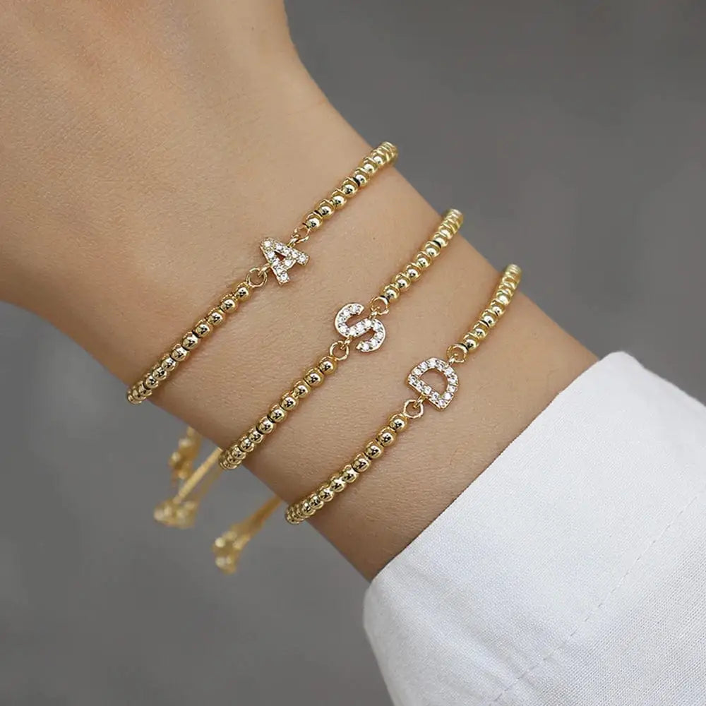 Bracelet Ajustable avec une Lettre - Passeport Cases