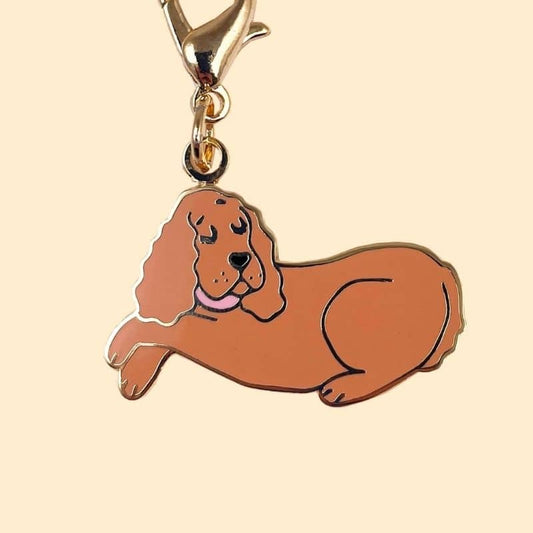 Key holder and dog medal in the shape of a cocker spaniel with golden detail by cuckoo suzette