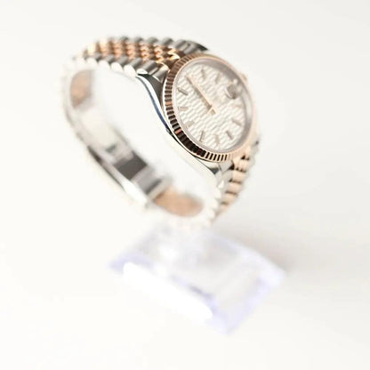 Datejust Rosegold Riffelmuster 36 - Passeport Cases