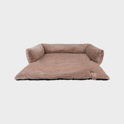 Hundbäddsskydd av taupe faux päls soffa