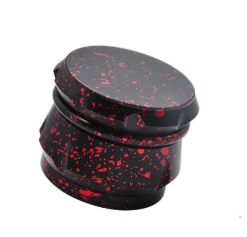 grinder tacheté noir et rouge