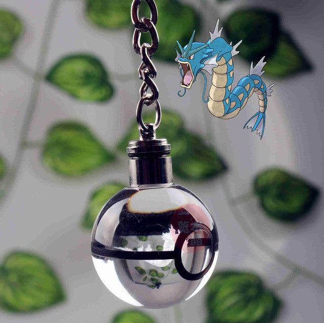 Colgante Pokebola Lumineux avec Motifs Pokémon