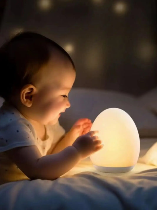 Oval night light with variable colors for baby